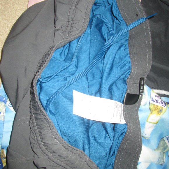 All four Swim Trunks, Men's two are XXL. One is 40/42, one is 38 - Picture 5 of 6